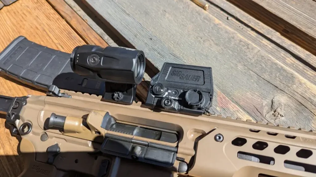 The Sig Romeo 8T AMR uses an magnetic sensor to change reticles.