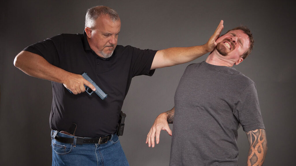 The author utilizing budo practices during firearm training.