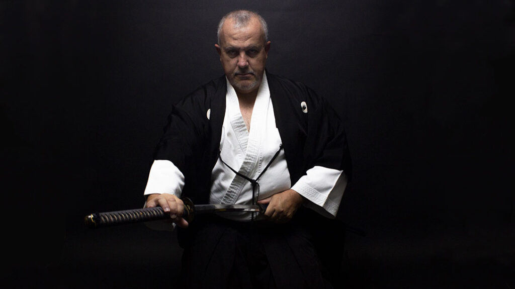 The author drawing a katana.