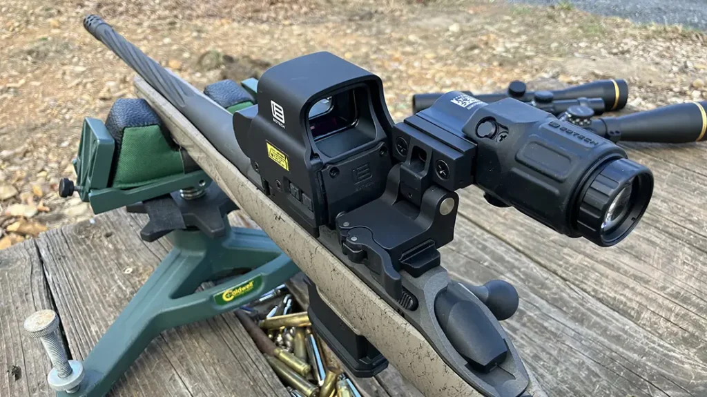 An EO TECH EXPS2-2 and G33.STS 3x magnifier combo was chosen for use on the Ruger G2 Ranch.  The G33 3x magnifier sitting behind the EXPS2-2 is on a tilt mount, allowing it to be swung out of the way until the situation calls for its use.